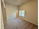 Spacious bedroom with carpeted floors and large window at 3964 Riverchess Lot 157 Dr, Atlanta, GA 30331