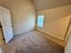 Bright bedroom with neutral carpeting and window at 3964 Riverchess Lot 157 Dr, Atlanta, GA 30331