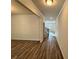 Bright foyer with hardwood floors and view of staircase at 3964 Riverchess Lot 157 Dr, Atlanta, GA 30331