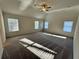 Large main bedroom with high ceilings and carpet at 3964 Riverchess Lot 157 Dr, Atlanta, GA 30331