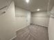 Large walk-in closet with double hanging rods at 3964 Riverchess Lot 157 Dr, Atlanta, GA 30331