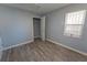 Cozy bedroom with wood-look floors and a closet at 967 Metropolitan Sw Pkwy, Atlanta, GA 30310