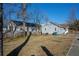 House exterior showcasing a side yard and neighboring house at 967 Metropolitan Sw Pkwy, Atlanta, GA 30310