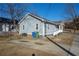 House exterior with driveway and mature trees at 967 Metropolitan Sw Pkwy, Atlanta, GA 30310