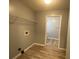 Laundry area with shelving and linoleum flooring at 967 Metropolitan Sw Pkwy, Atlanta, GA 30310