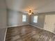 Living room with gray walls, wood-look flooring and ceiling fan at 967 Metropolitan Sw Pkwy, Atlanta, GA 30310