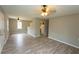 Open concept living and dining areas with a view into the adjacent kitchen with an island at 967 Metropolitan Sw Pkwy, Atlanta, GA 30310