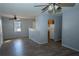 Open living room and kitchen with wood-look floors at 967 Metropolitan Sw Pkwy, Atlanta, GA 30310