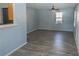 Living room with light gray walls and wood-look floors at 967 Metropolitan Sw Pkwy, Atlanta, GA 30310