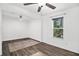 Bright bedroom with hardwood floors and large window at 125 Clayton St, Fairburn, GA 30213