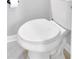 Clean bathroom with a toilet and white seat at 589 Norman Nw Way, Kennesaw, GA 30144