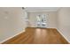 Bright dining area with light wood flooring and a sliding glass door to the outside at 1094 Old Roswell Rd, Roswell, GA 30076