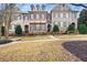 Attractive three-story townhome with landscaping and walkway at 2344 Saint Davids Nw Sq # 2, Kennesaw, GA 30152