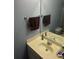 Bathroom with sink and mirror at 240 Flowers Cove Ln, Lilburn, GA 30047