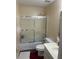 Clean bathroom with shower/tub combo at 240 Flowers Cove Ln, Lilburn, GA 30047