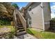 Home's exterior features wooden stairs and siding at 4115 Brightmore Dr, Austell, GA 30106