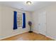 Bright bedroom featuring wood floors and window at 247 Island Shoals Rd, Covington, GA 30016