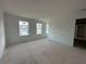 Spacious bedroom with drywall and two large windows at 7293 Eton Ln, Locust Grove, GA 30248