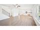 Bright, open-concept living space flowing into a modern kitchen with a large island at 7293 Eton Ln, Locust Grove, GA 30248