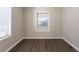 Spacious bedroom with vinyl plank flooring and window blinds at 1851 Ridgeland Dr, Decatur, GA 30032