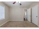 Bright bedroom featuring a ceiling fan and access to other rooms at 1851 Ridgeland Dr, Decatur, GA 30032