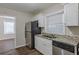 Updated kitchen with stainless steel appliances and granite countertops at 1851 Ridgeland Dr, Decatur, GA 30032