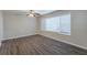 Bright living room with ceiling fan and vinyl plank flooring at 1851 Ridgeland Dr, Decatur, GA 30032