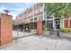 Brick building with gated parking and signage at 505 Whitehall Sw St # 101, Atlanta, GA 30303