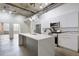 Modern kitchen with island and exposed ductwork at 505 Whitehall Sw St # 101, Atlanta, GA 30303