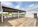 Spacious rooftop deck with wooden flooring and pergola at 505 Whitehall Sw St # 101, Atlanta, GA 30303