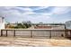 Rooftop deck with wooden flooring and railings, offering city skyline views at 505 Whitehall Sw St # 101, Atlanta, GA 30303