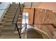 View from the top of aged concrete stairs with metal railing at 505 Whitehall Sw St # 101, Atlanta, GA 30303