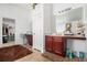 Double vanity bathroom with walk-in closet at 7705 Sylvaner Ln, Atlanta, GA 30349