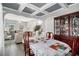 Dining room with hardwood floors and a crystal chandelier at 7705 Sylvaner Ln, Atlanta, GA 30349