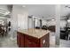 Large kitchen island with granite top, offering extra prep space at 7705 Sylvaner Ln, Atlanta, GA 30349