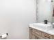 Simple bathroom with a floating vanity and modern fixtures at 201 Edwards Brook Ct, Canton, GA 30115