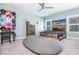 Bedroom with a wooden bed frame and a beanbag chair at 201 Edwards Brook Ct, Canton, GA 30115