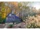 Charming chicken coop in a wooded backyard at 201 Edwards Brook Ct, Canton, GA 30115