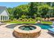 Relaxing hot tub with stone surround at 201 Edwards Brook Ct, Canton, GA 30115