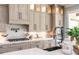 Modern kitchen with light wood cabinets and quartz counters at 201 Edwards Brook Ct, Canton, GA 30115