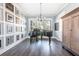 Music room featuring a black grand piano and gallery wall filled with Gathering photos at 201 Edwards Brook Ct, Canton, GA 30115