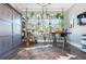 Home office with built-in bookshelves, a comfortable workspace, and abundant natural light at 201 Edwards Brook Ct, Canton, GA 30115