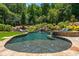 Resort-style pool with waterfall and spa at 201 Edwards Brook Ct, Canton, GA 30115