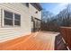 Spacious back deck with wooden railings, offering ample outdoor space at 6820 Milbury Ct, Alpharetta, GA 30005