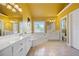 Bathroom boasts a large soaking tub, double vanity, and shower at 6820 Milbury Ct, Alpharetta, GA 30005