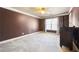 Large bedroom with dark brown dresser and ceiling fan at 6820 Milbury Ct, Alpharetta, GA 30005