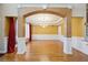 Formal dining room with hardwood floors and chair rail at 6820 Milbury Ct, Alpharetta, GA 30005