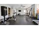 Home gym with various equipment including treadmill and weights at 6820 Milbury Ct, Alpharetta, GA 30005