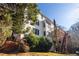 Exterior view of two story house with deck and landscaping at 6820 Milbury Ct, Alpharetta, GA 30005