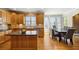 Kitchen features an island, hardwood floors and ample cabinet space at 6820 Milbury Ct, Alpharetta, GA 30005